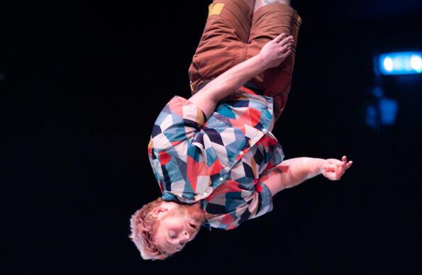 An acrobat performs a film at Revel Puck Circus performance