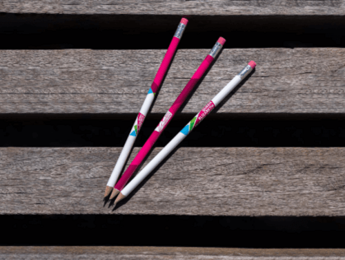 Three pencils with the logo of Queen Elizabeth Olympic Park