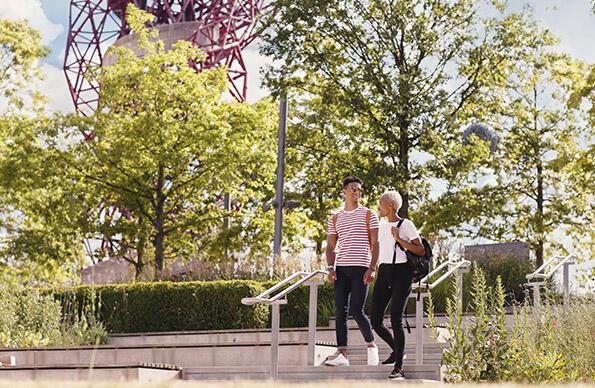 Couple walking in 2012 Gardens in Summer