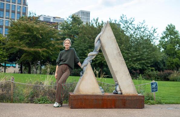 Polly with the sculpture