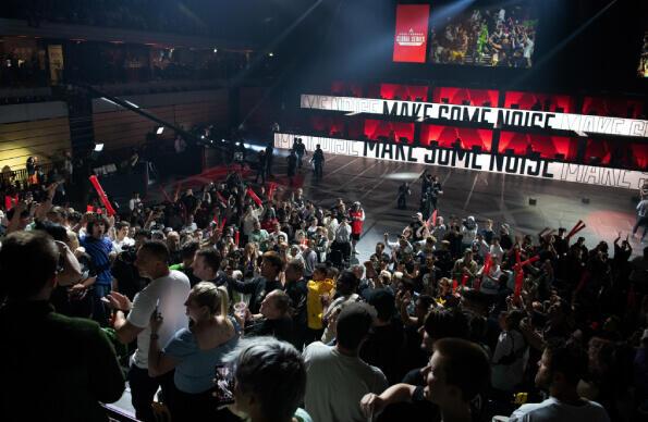 A Crowd at Copper Box Arena cheers for e-sports players