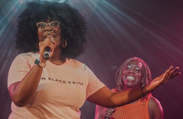 2 singers on stage at UK Black Pride