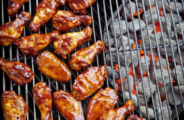 Chicken wings grilling on a BBQ