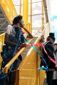 Students talking in stairwell