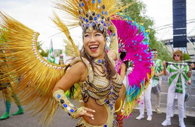 A dancer poses at the Great Get Together event